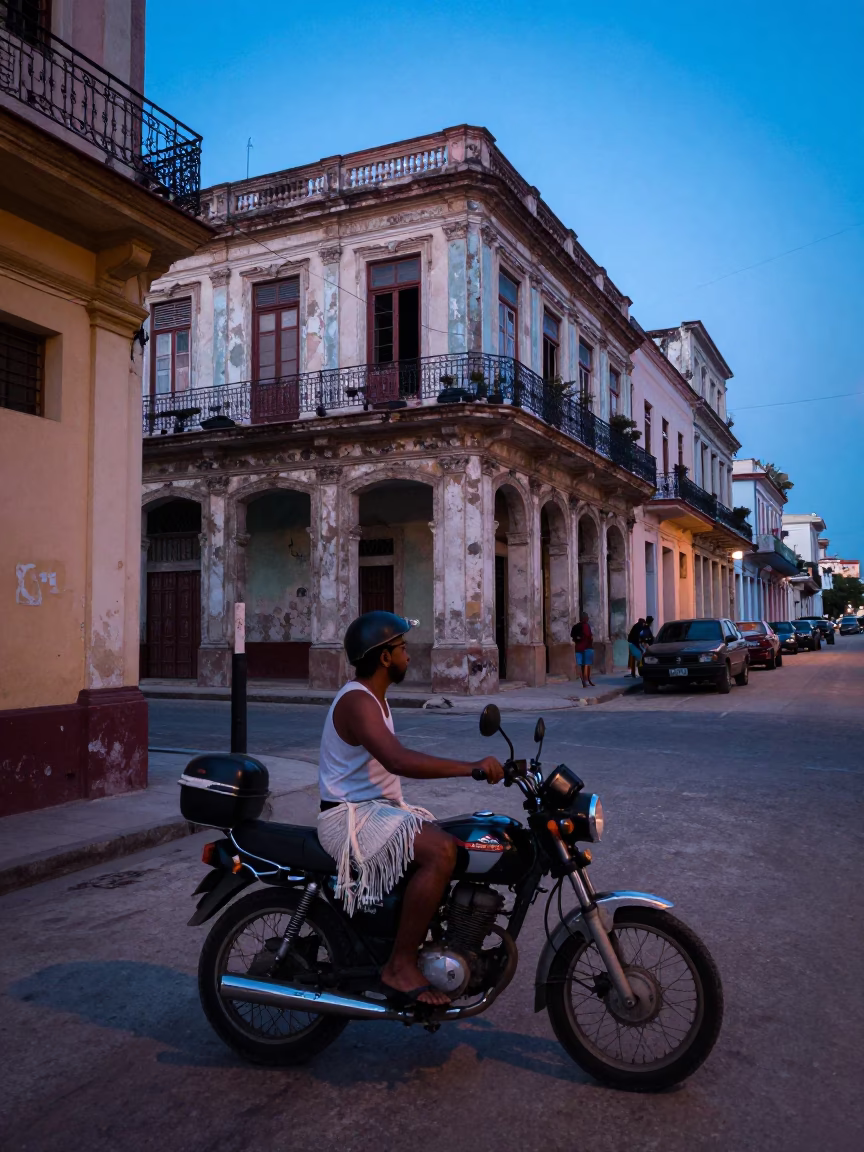 Evening Street Scene in Havana Cuba with Motorcycle and Linen Fringe in in Havana, Cuba
