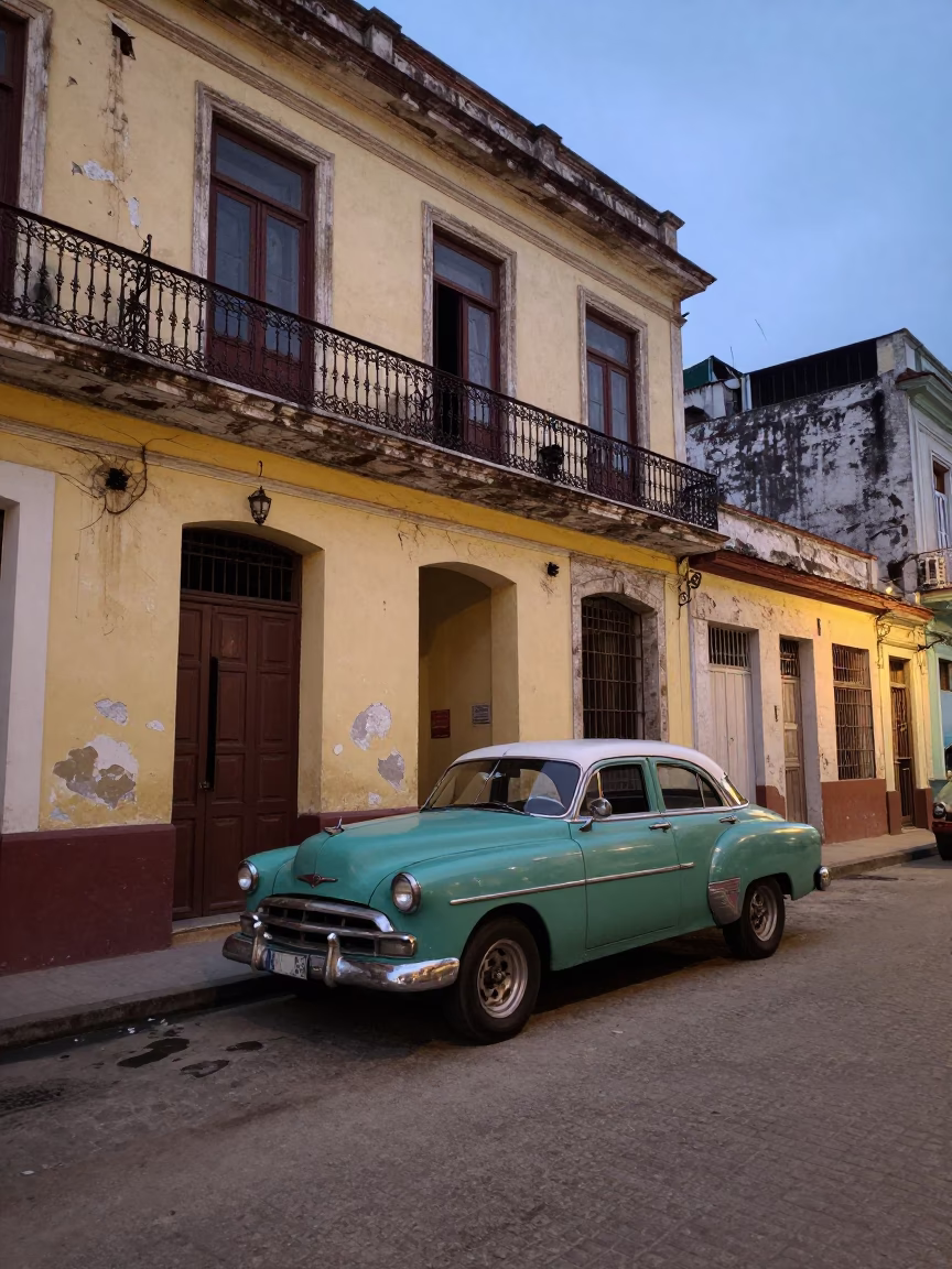 Evening Street Scene in Havana Cuba with Vintage Car and Local Architecture in in Havana, Cuba
