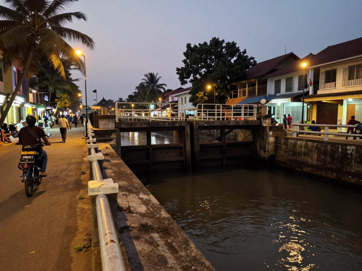 Evening Street Scene in Kochi India with Sluice Gate and Canal Edge in in Kochi, India
