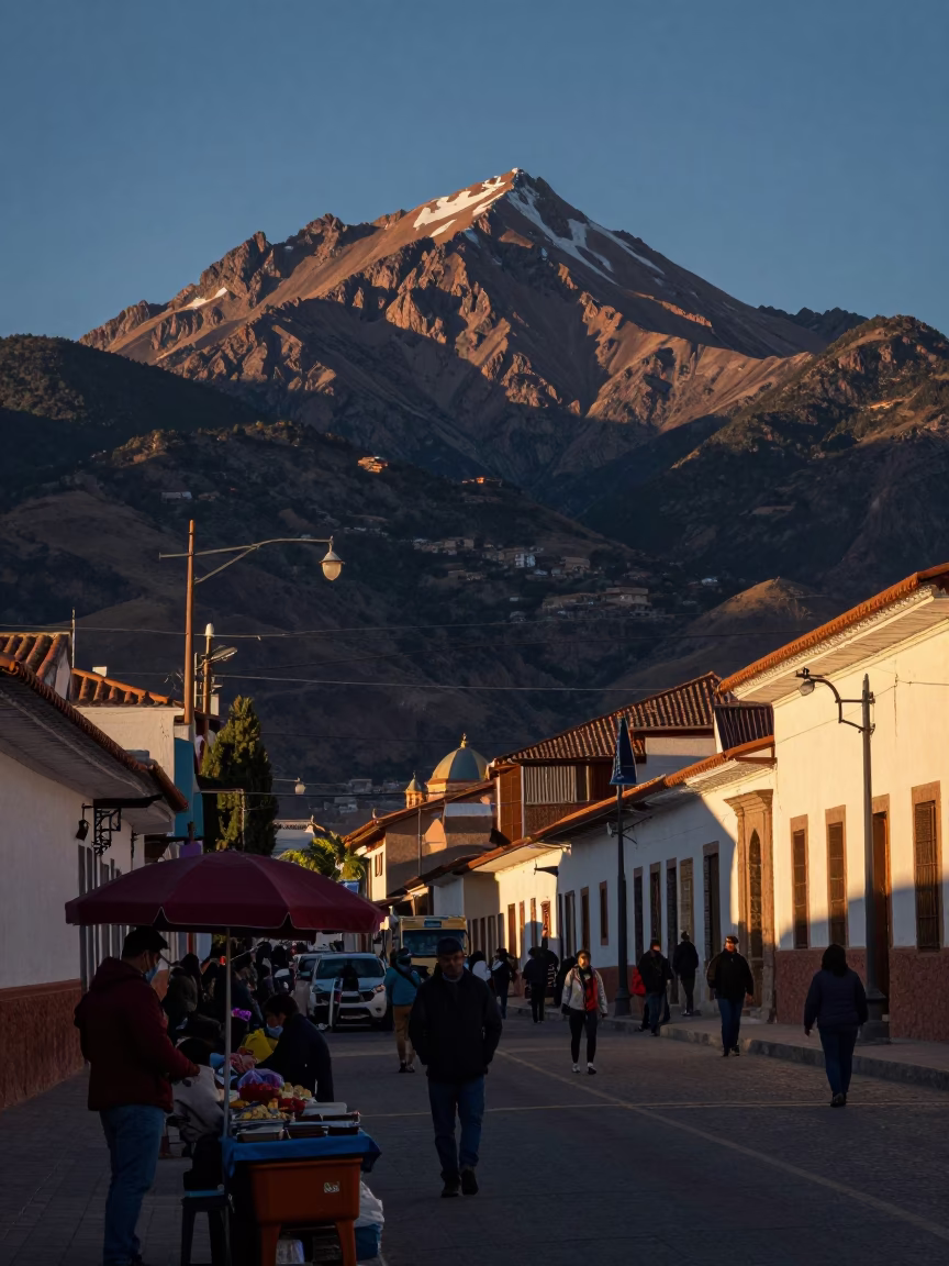 Evening street scene in La Paz with vendors and Andean mountains in in La Paz, Bolivia