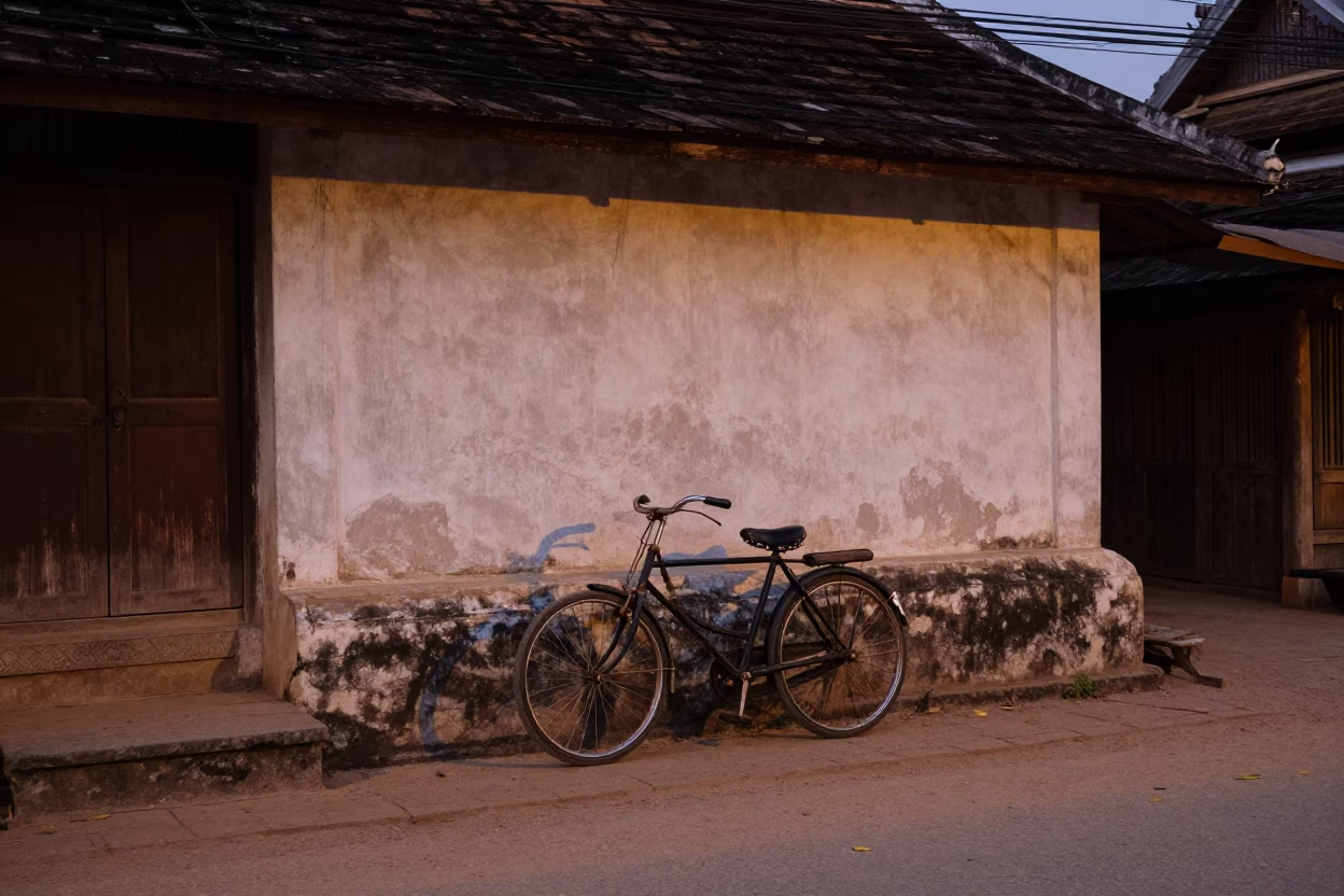 Evening Street Scene in Luang Prabang Laos with Vintage Bicycle and Local Life in in Luang Prabang, Laos