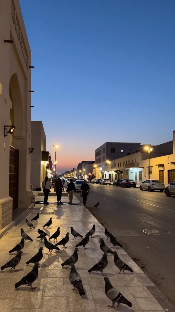 Evening Street Scene in Muscat Oman with Pigeons and Traditional Architecture in in Muscat, Oman