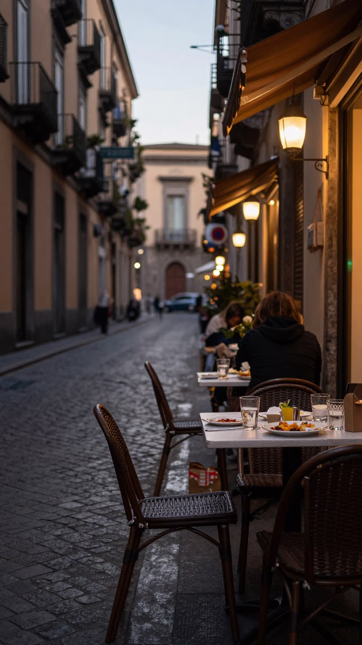 Evening Street Scene in Naples Italy with Glass Tumblers and Local Life in in Naples, Italy