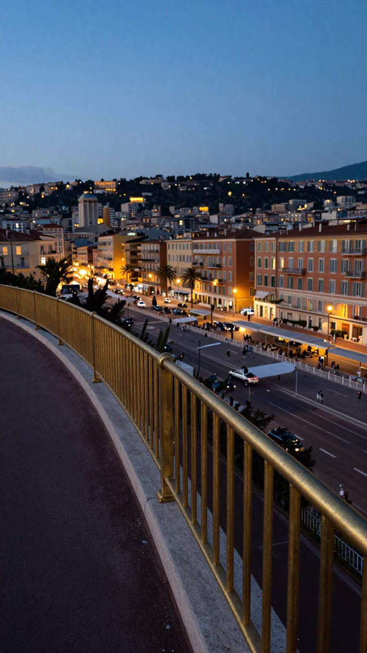 Evening Street Scene in Nice France with Brass Rail and City Lights in in Nice, France