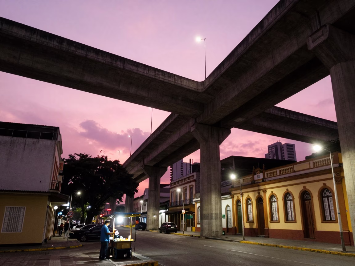 Evening Street Scene in Salvador Brazil with Highway Flyover and Pink Sky in in Salvador, Brazil