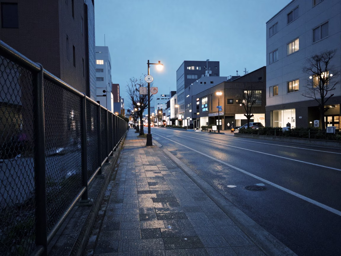 Evening Street Scene in Sapporo Japan with Substation Fence and Dew in in Sapporo, Japan