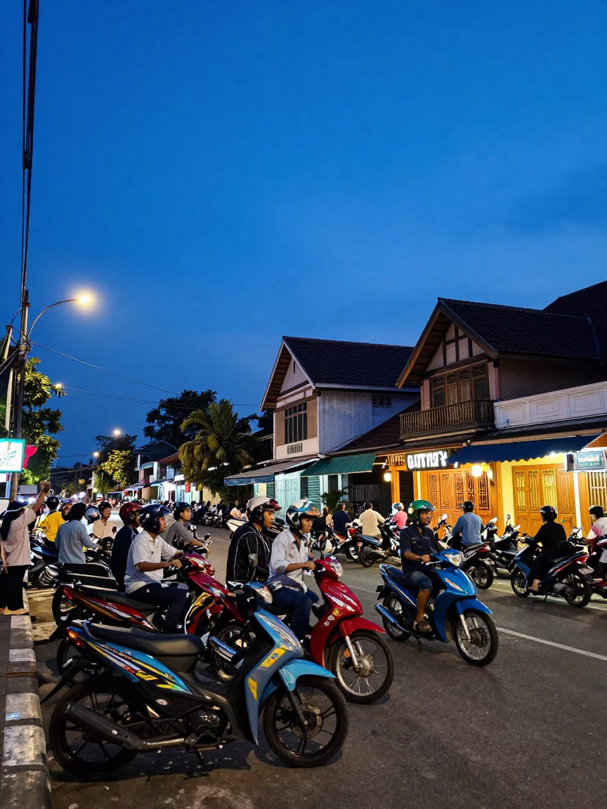 Evening Street Scene in Surabaya Indonesia with Colorful Motorcycles and Traditional Architecture in in Surabaya, Indonesia