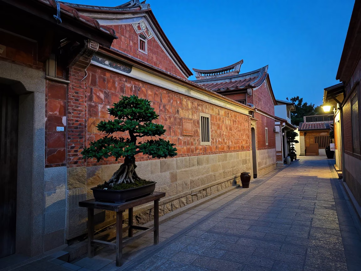 Evening Street Scene in Tainan Taiwan with Bonsai Tree and Traditional Architecture in in Tainan, Taiwan