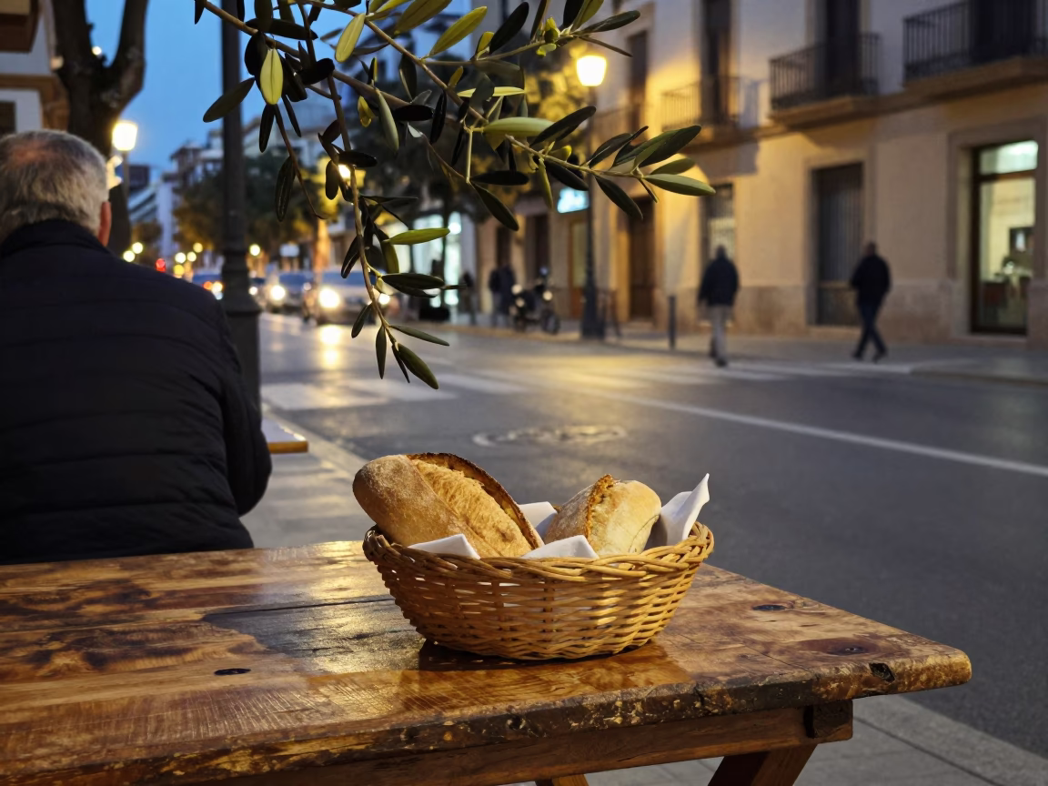 Evening Street Scene in Valencia Spain with Olive Branch and Bread Basket in in Valencia, Spain
