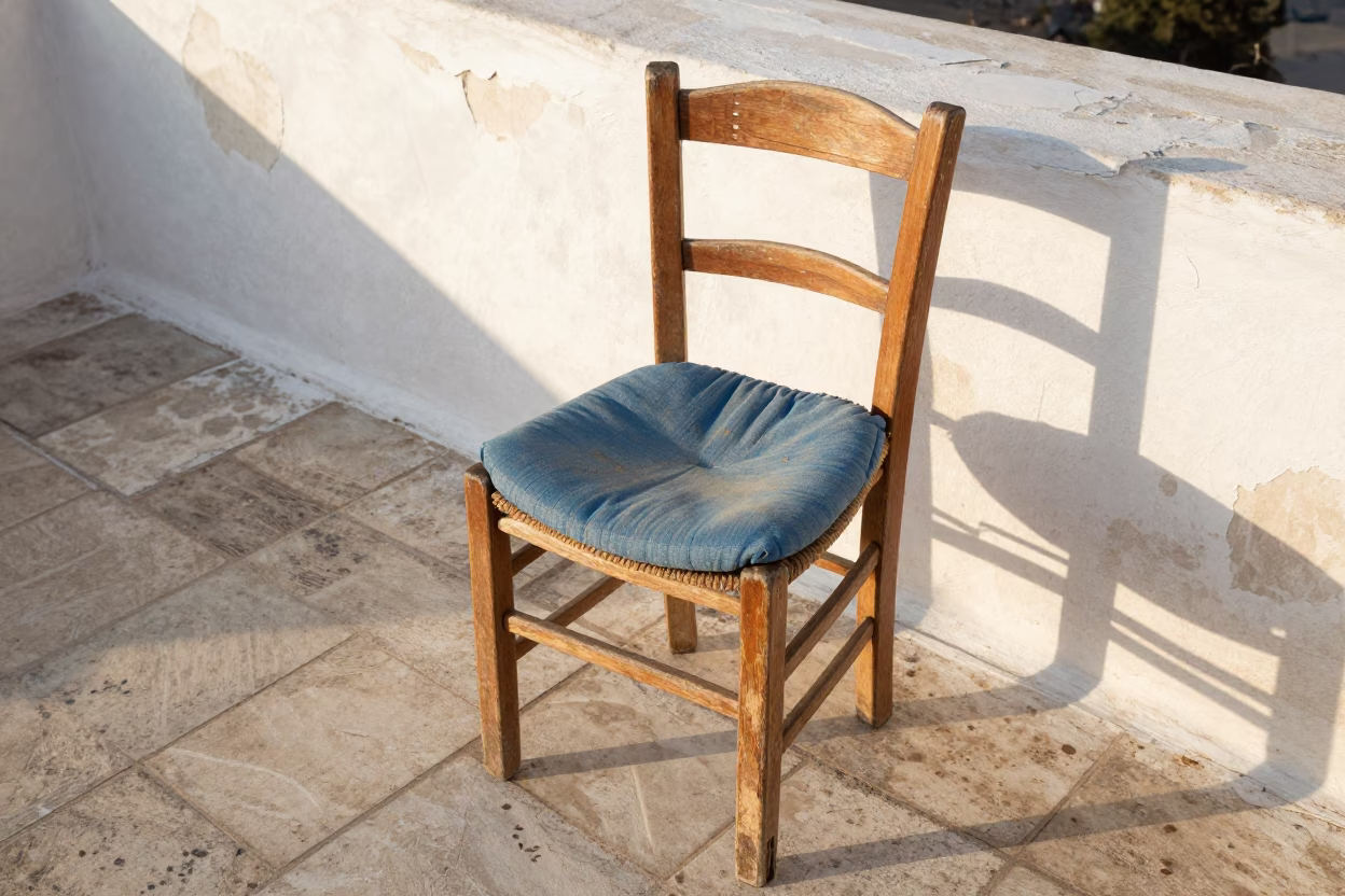 Faded Blue Chair Cushion in Athens in in Athens, Greece