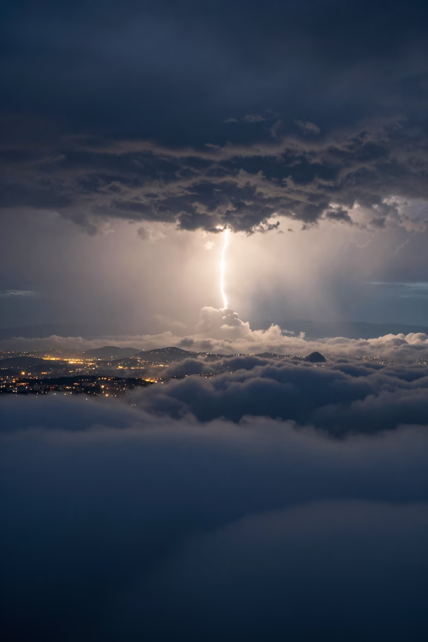 Fallstreak Hole Over Lombardy Thunderheads in over a horizon of stacked thunderheads in Lombardy