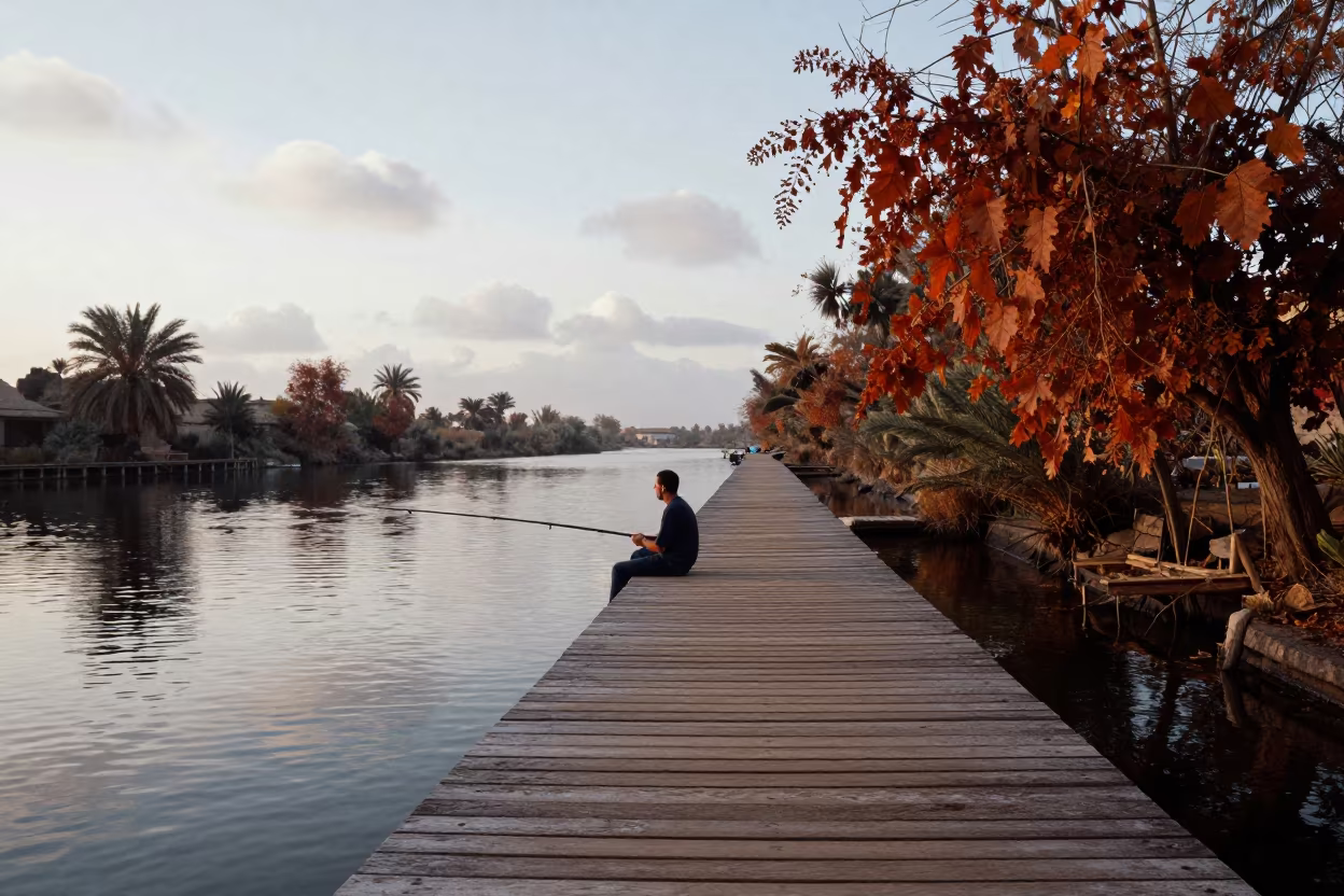 Father and Son Fishing at Dawn in beside a canal in Faiyum