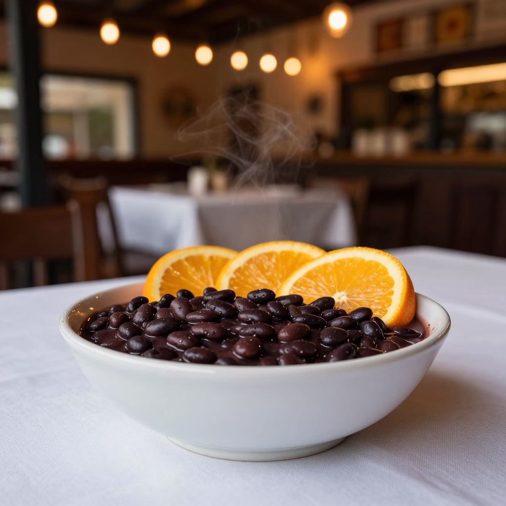 Feijoada Bowl with Orange Slices on Linen Table in on a linen-covered restaurant table in Wollongong