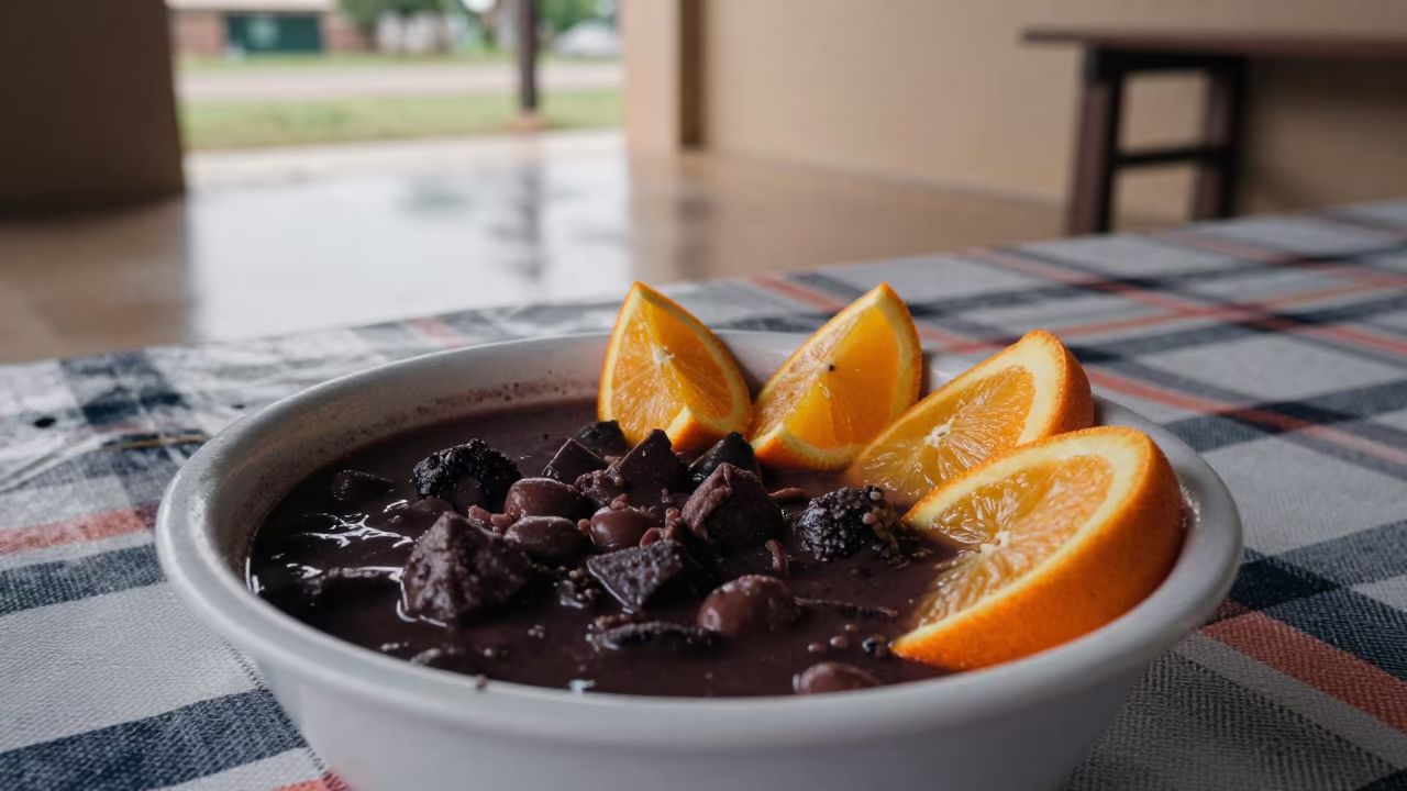 Feijoada Bowl with Orange Slices Picnic in on a picnic blanket in Kenema