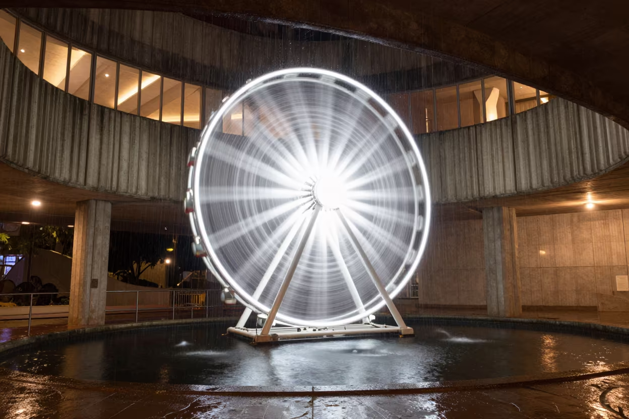 Ferris Wheel Spoke Trails Over Black Water in inside a ribbed concrete lobby near Oruro