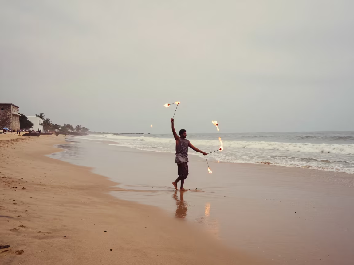 Fire Dancer Spinning Poi on Cartagena Beach in in Cartagena