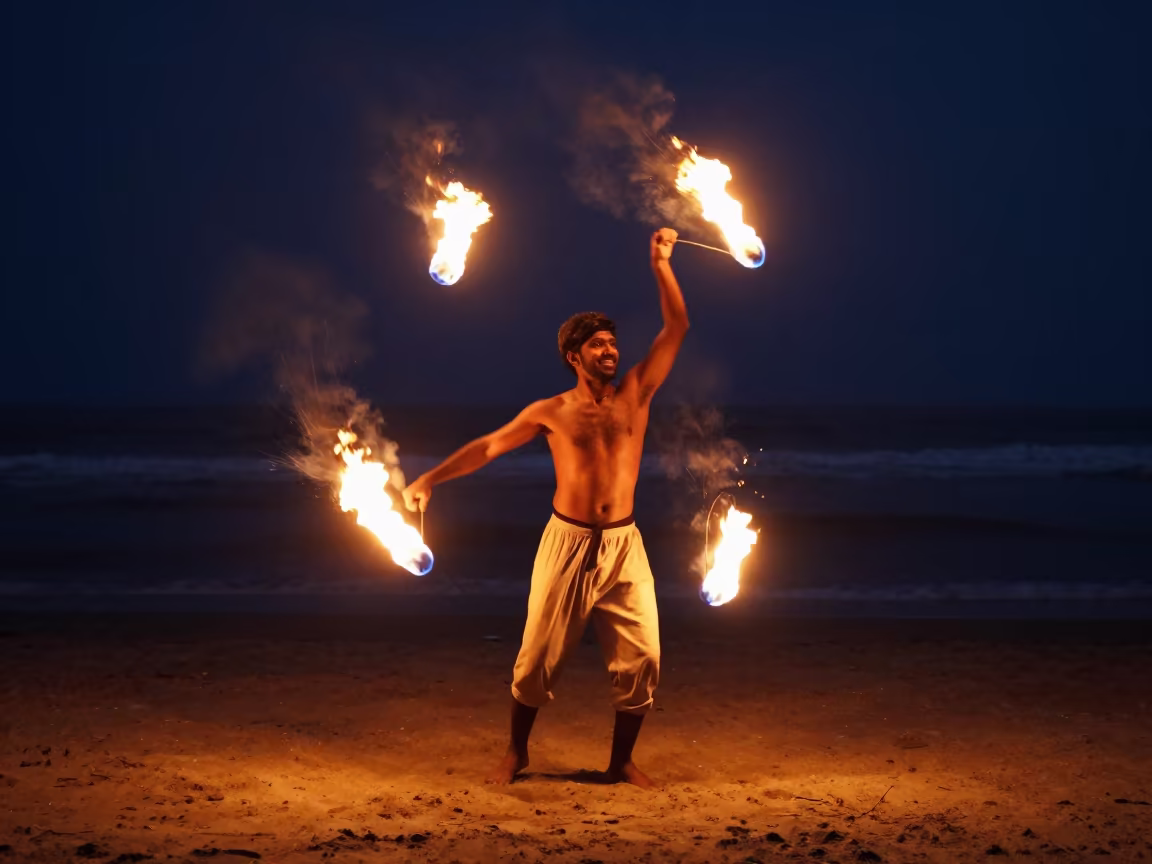 Fire Dancer Spinning Poi on Mumbai Beach Night in in the old quarter in Mumbai