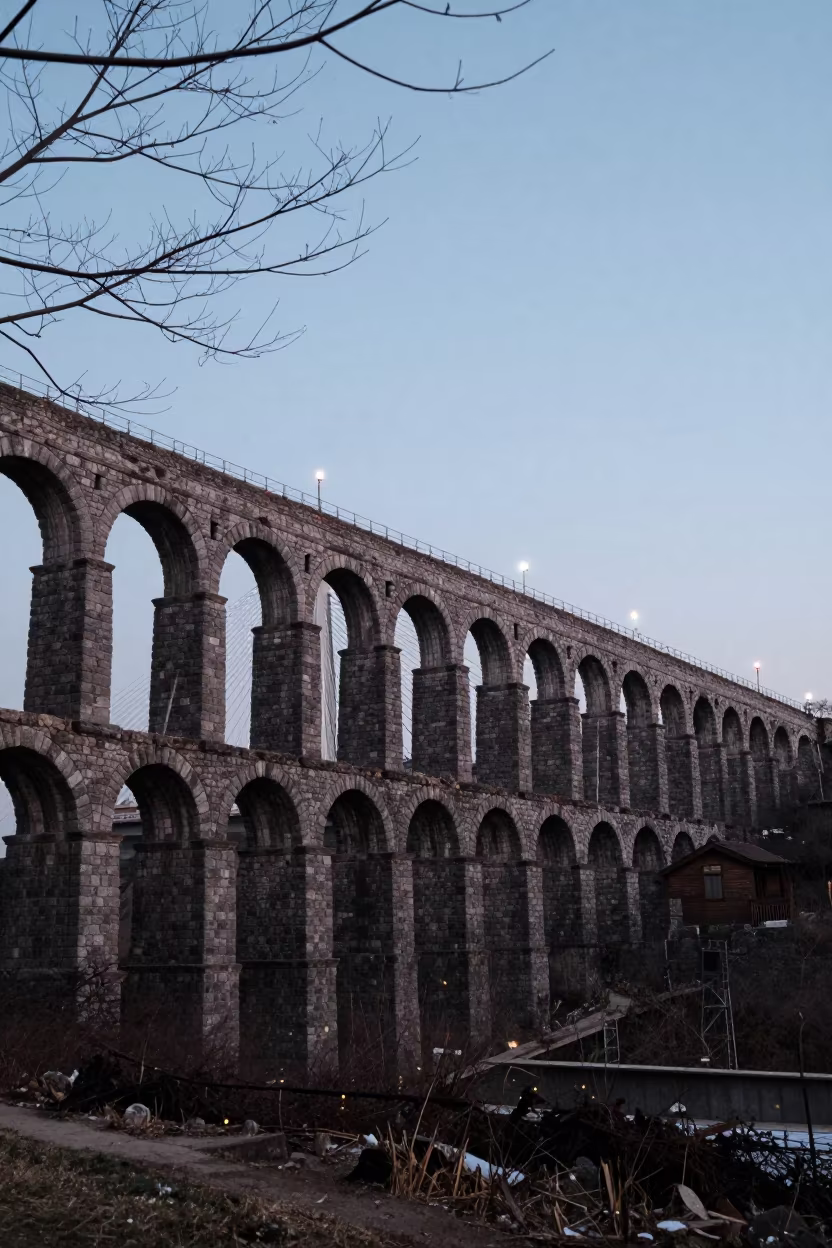 Fireflies Over Winter Ruined Aqueduct Masan in under a cable-stayed bridge span in Masan