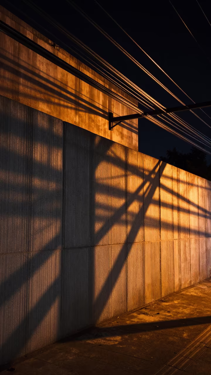 Firelight Shadows on Concrete Cables Etah Night in inside a ribbed concrete lobby in Etah