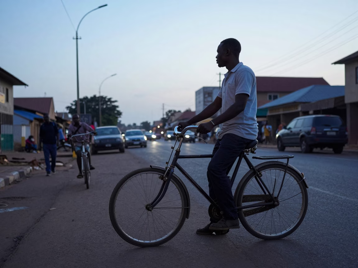 First Light Dawn in Accra Ghana with Bicycle and Street Life in in Accra, Ghana