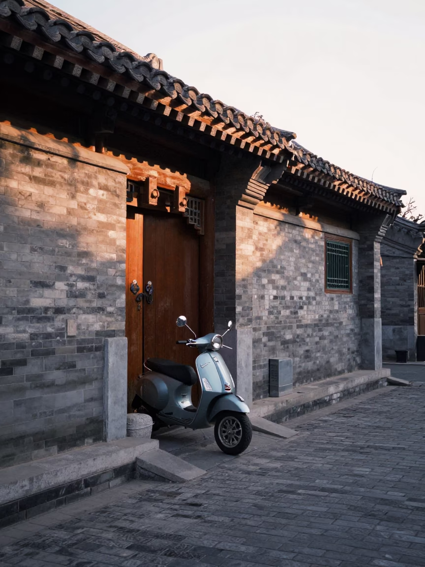 First Light Dawn in Beijing China with Vintage Vespa on Cobblestone Lane in in Beijing, China