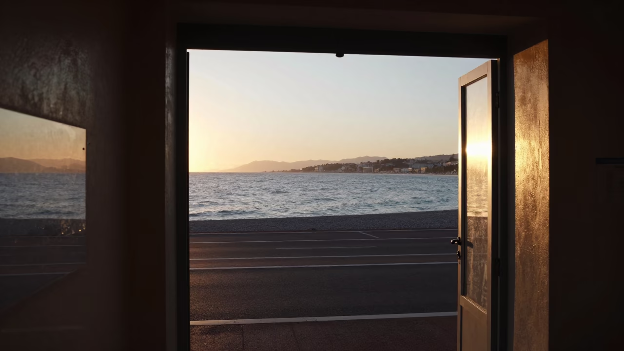 First light dawn on the Promenade des Anglais with sun stripe and coiled rope in in Nice, France