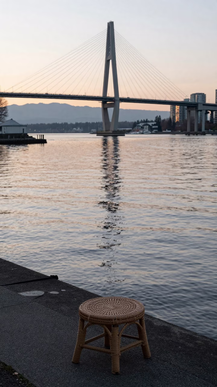 First Light Dawn on Vancouver Waterfront with Rattan Stool and Scratched Bench in in Vancouver, British Columbia, Canada