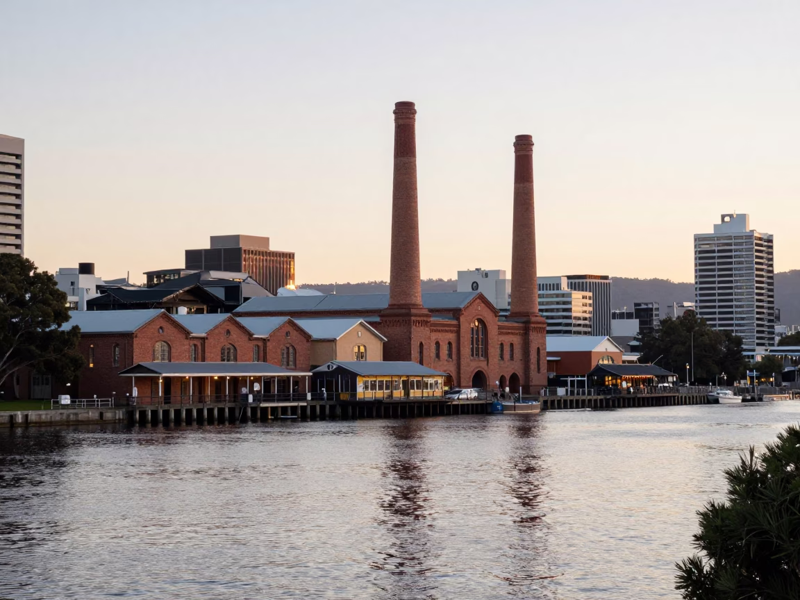 First Light Illuminates Hobart Waterfront with Cannery Wharf and Morning Commuters in in Hobart, Tasmania, Australia
