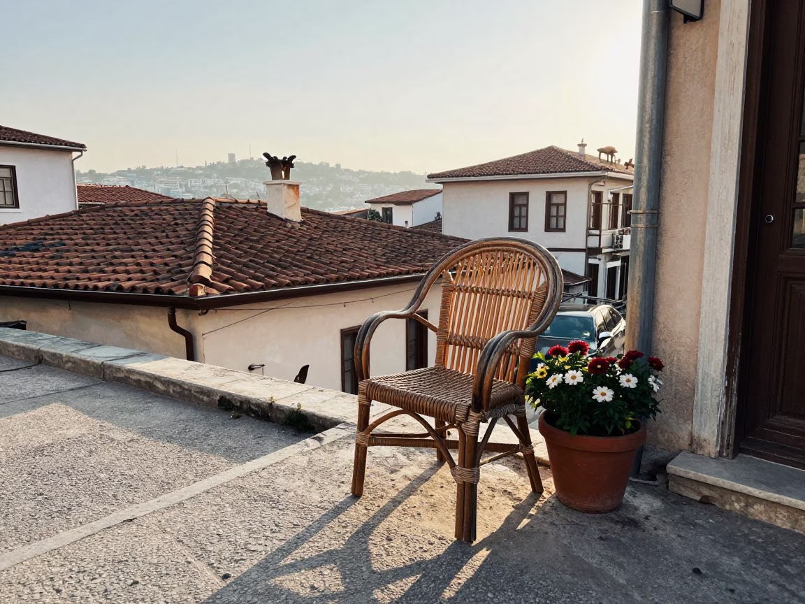 First Light Morning in Izmir Turkey with Rattan Chair and Flowerpot in in Izmir, Turkey