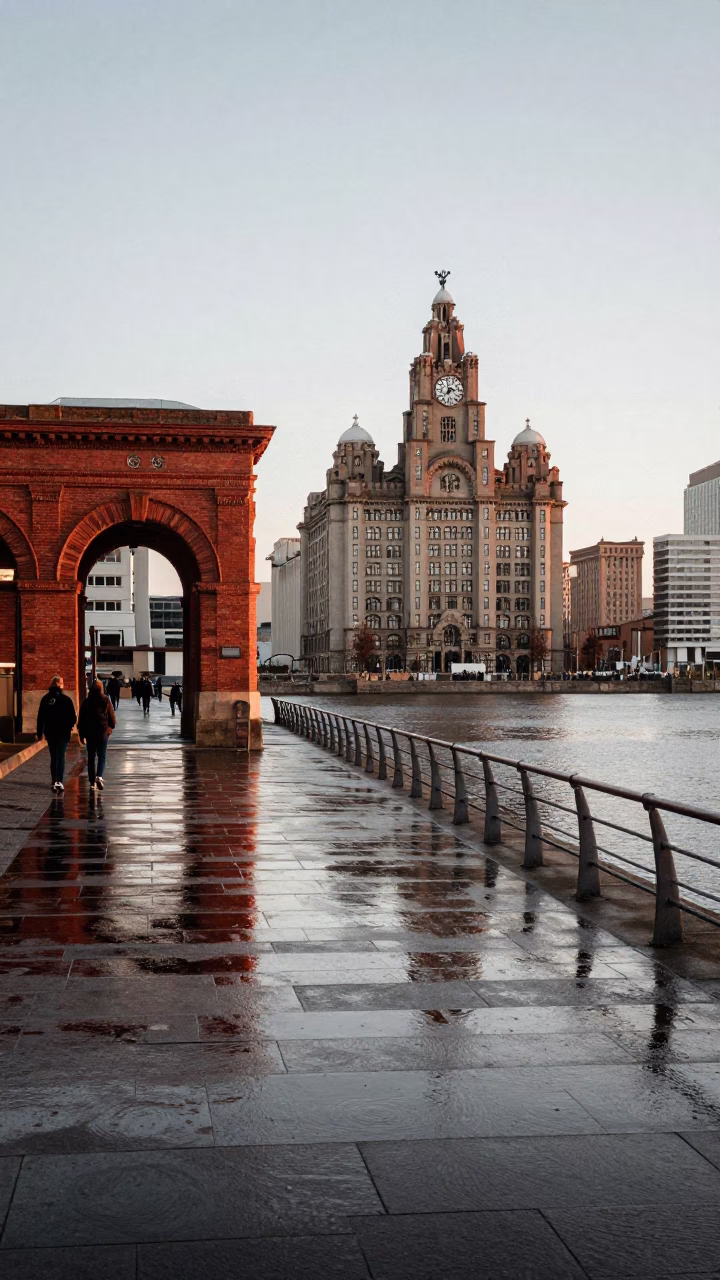 First Light on Liverpool Waterfront with University Archway and Wet Bicycle Rack in in Liverpool, United Kingdom
