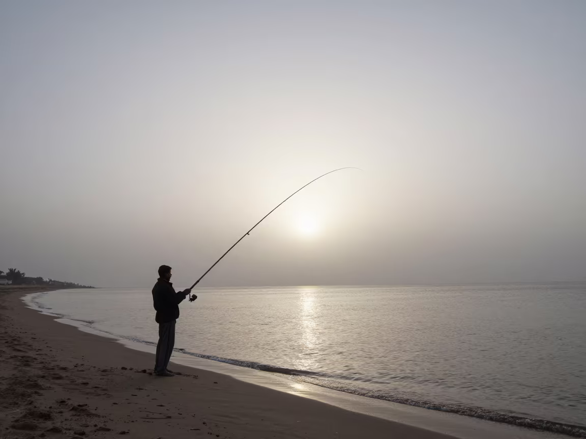 Fisherman Casting Line at Dawn Near El Mahalla in along a beach near El Mahalla El Kubra