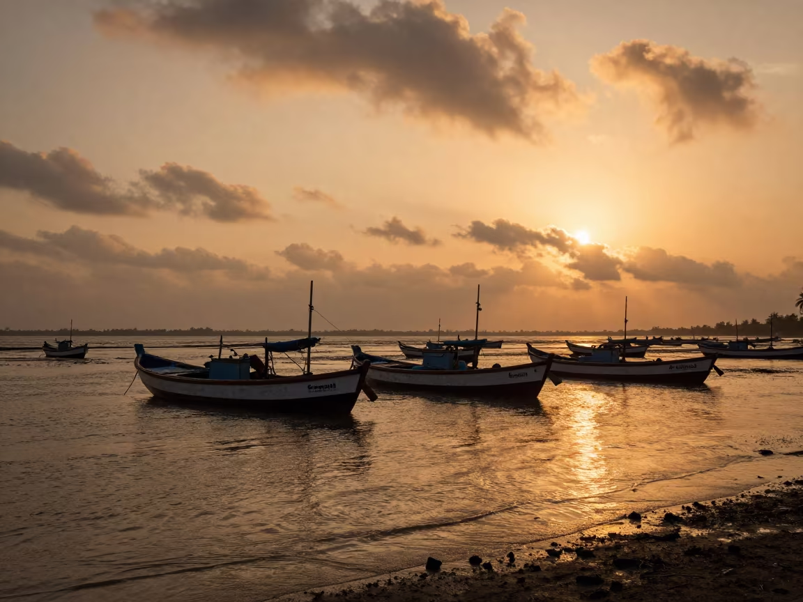 Fishing Boats in Golden Hour Light After Rain in across a floodplain after rain near Mumbai