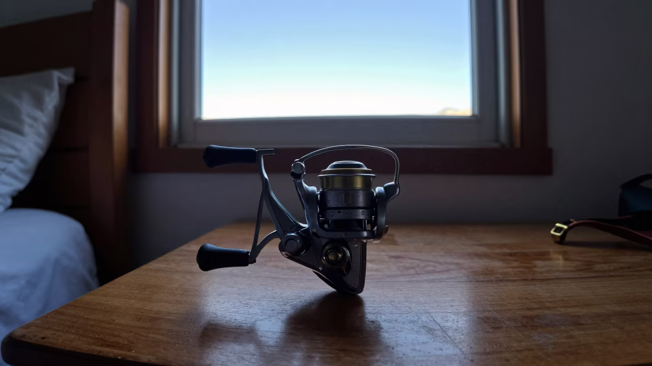 Fishing Reel on Bedside Table Dawn Light in on a bedside table near El Alto