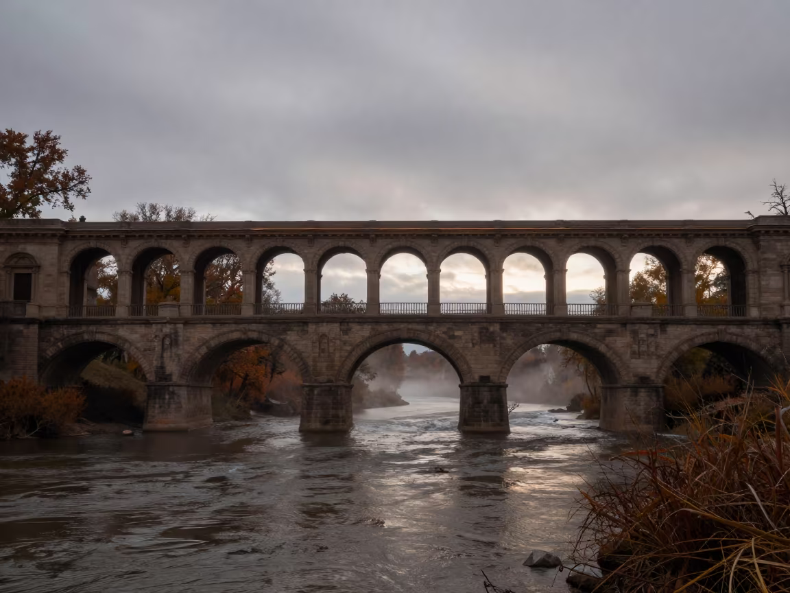 Five Arched Stone Bridge in Nevada Autumn Mist in along a colonnaded facade in Nevada