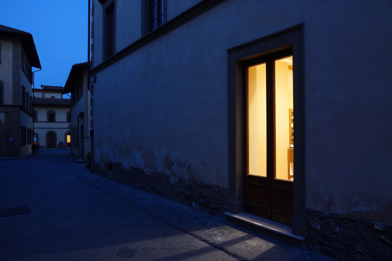 Florence Italy Twilight Street Scene with Glowing Window Light on Doorframe and Historic Architecture in in Florence, Italy