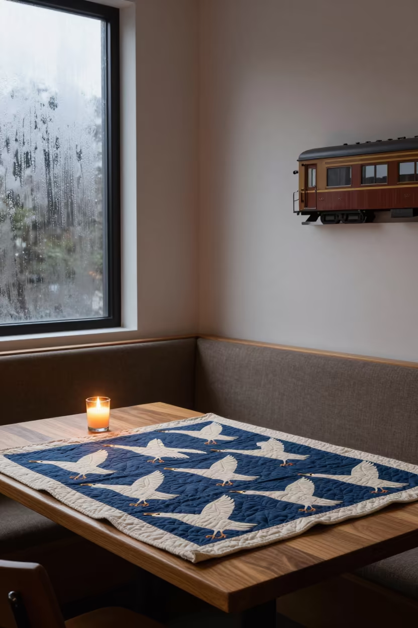 Flying Geese Quilt and Train Car Twilight in in a breakfast nook in Melbourne