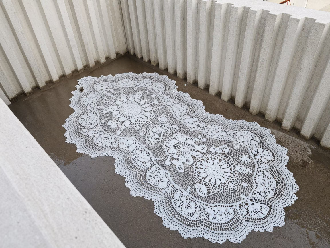 Foam Lace Pattern on Dark Sand Floor in inside a ribbed concrete lobby in Yozgat