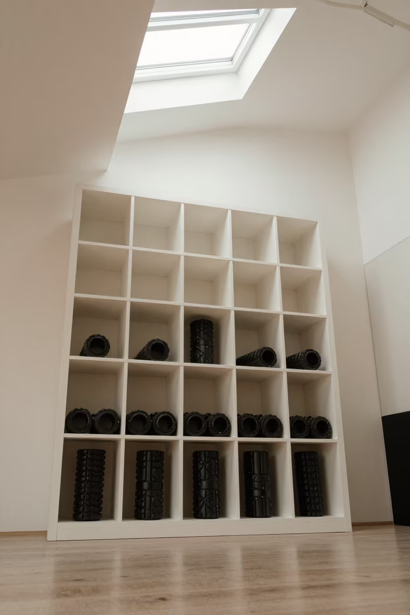 Foam Roller Cubby Wall in Montreal Spin Studio in inside a spin studio under class lights in Griffintown, Montreal