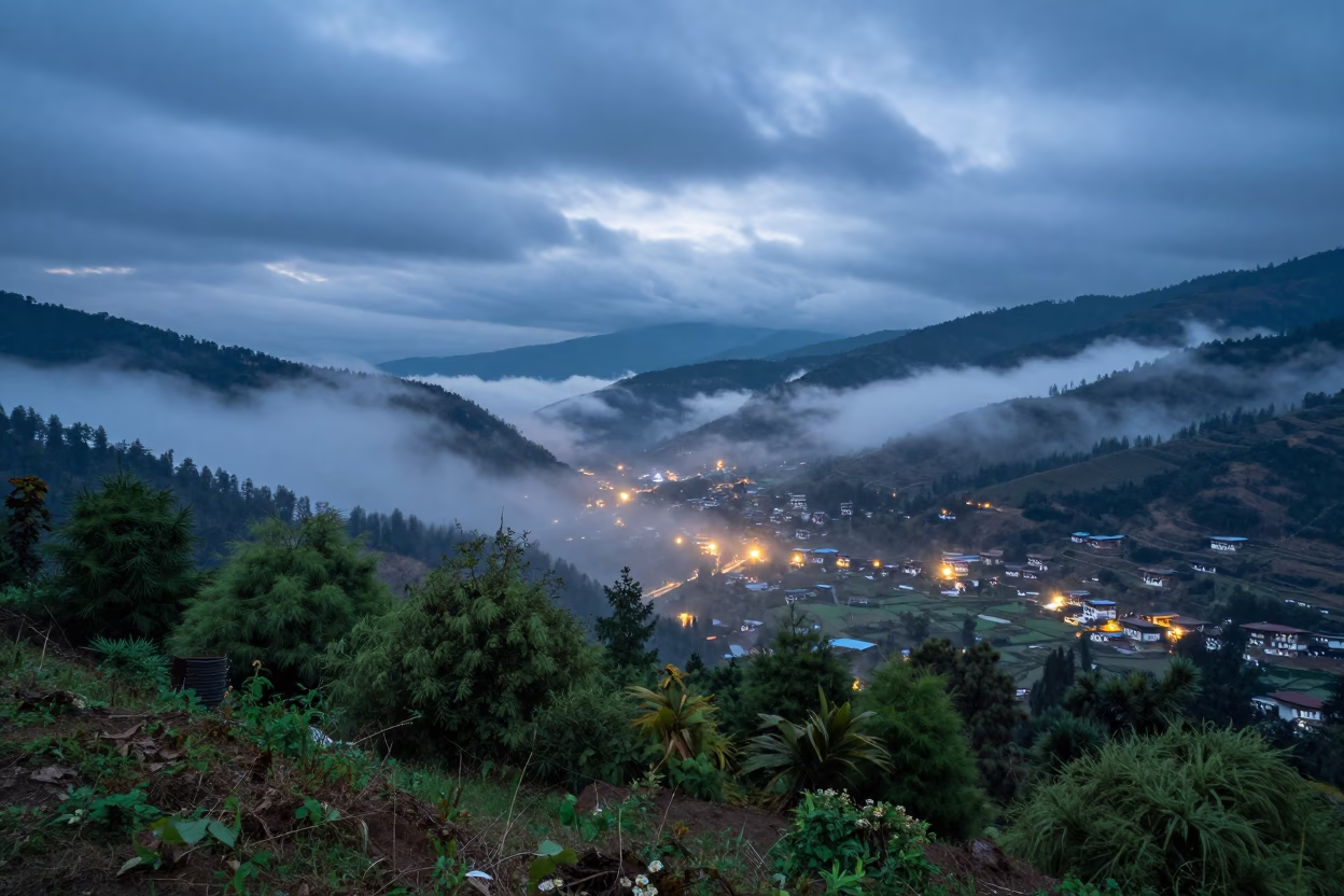 Fog Rolling Through Thimphu Valley at Blue Hour in beneath fast-moving cloud bands near Thimphu