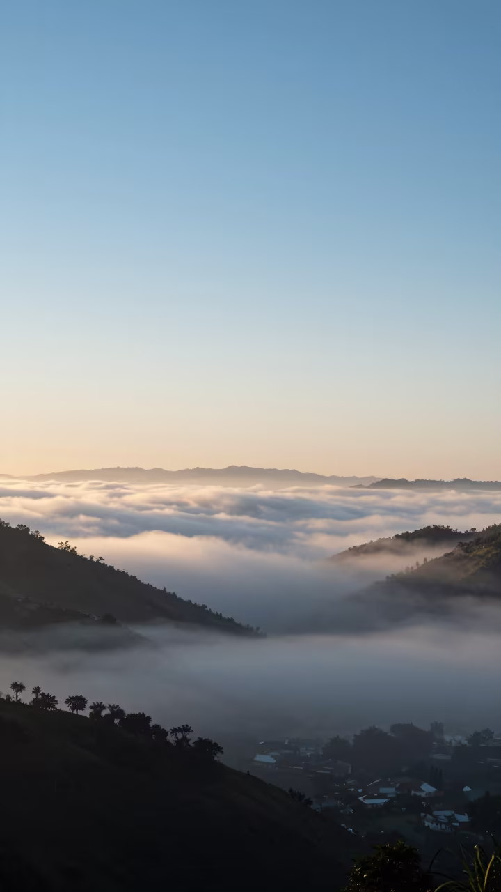Fog Sea Rolling Over Bazurto Market Valley at Dawn in over a horizon of stacked thunderheads near Bazurto Market, Cartagena