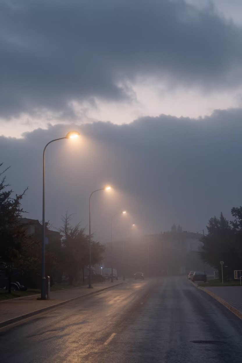 Fog Softens Streetlamps Under Clouds Near Ankara in beneath fast-moving cloud bands near Ankara