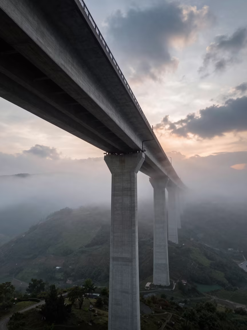 Fog Valley Viaduct Tbilisi Sunset Drone View in beneath a bridge span in Sololaki, Tbilisi