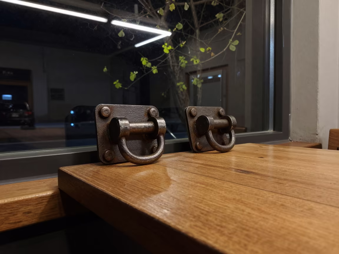 Forged Gate Latches on Cafe Table in on a cafe table by a window near Dera Ghazi Khan