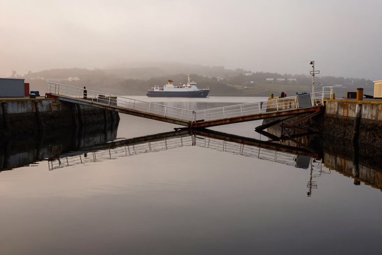 Forsaken Basque Ferry Terminal in Autumn Mist in beside a fogbound harbor mouth in the Basque Country