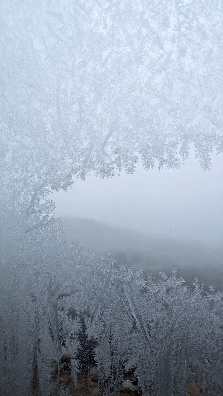 Frost Crystals on Window in Summer Drizzle in through low marine fog in Zhejiang