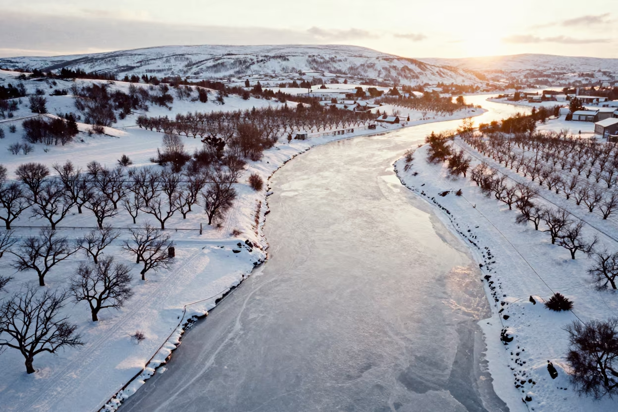 Frozen River in Winter Tundra Near Oslo in far above orchard blocks and irrigation lines near Oslo