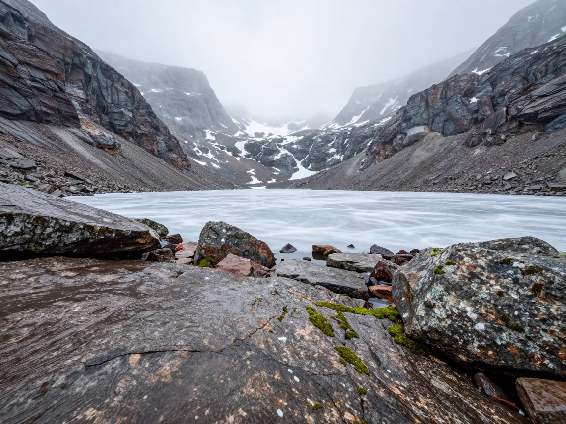 Frozen Tarn in Ontario Cirque Under Snowy Noon in in Ontario