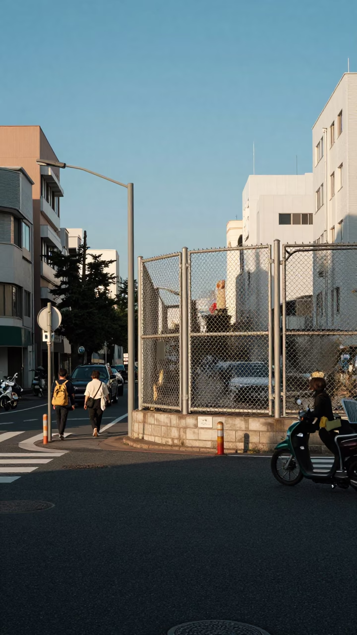 Fukuoka Japan Late Afternoon Street Scene with Substation Fence and Warning Placards in in Fukuoka, Japan