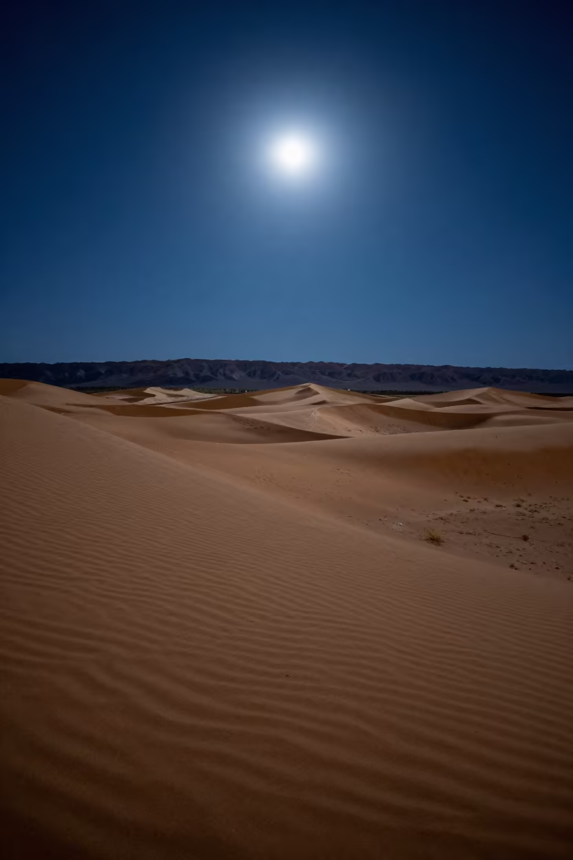 Full Moon Shadows on Utah Sand Dunes Night in under a dry plateau sky in Utah