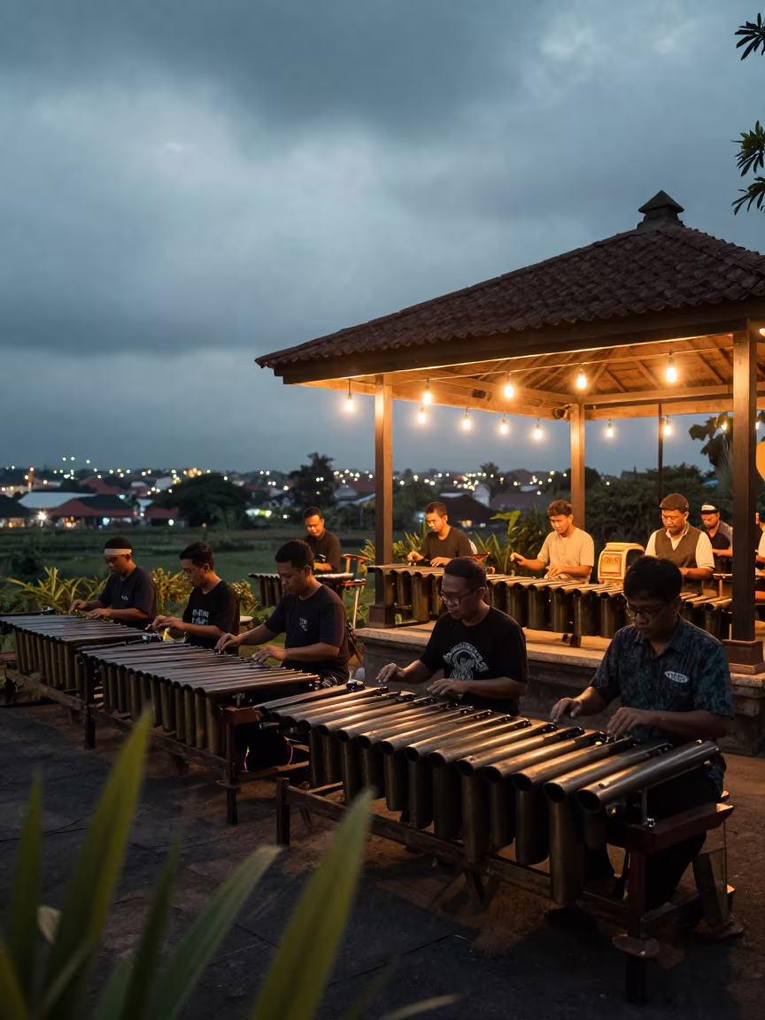 Gamelan Ensemble Performing Under Pavilion Lights in on a festival main stage in Yogyakarta